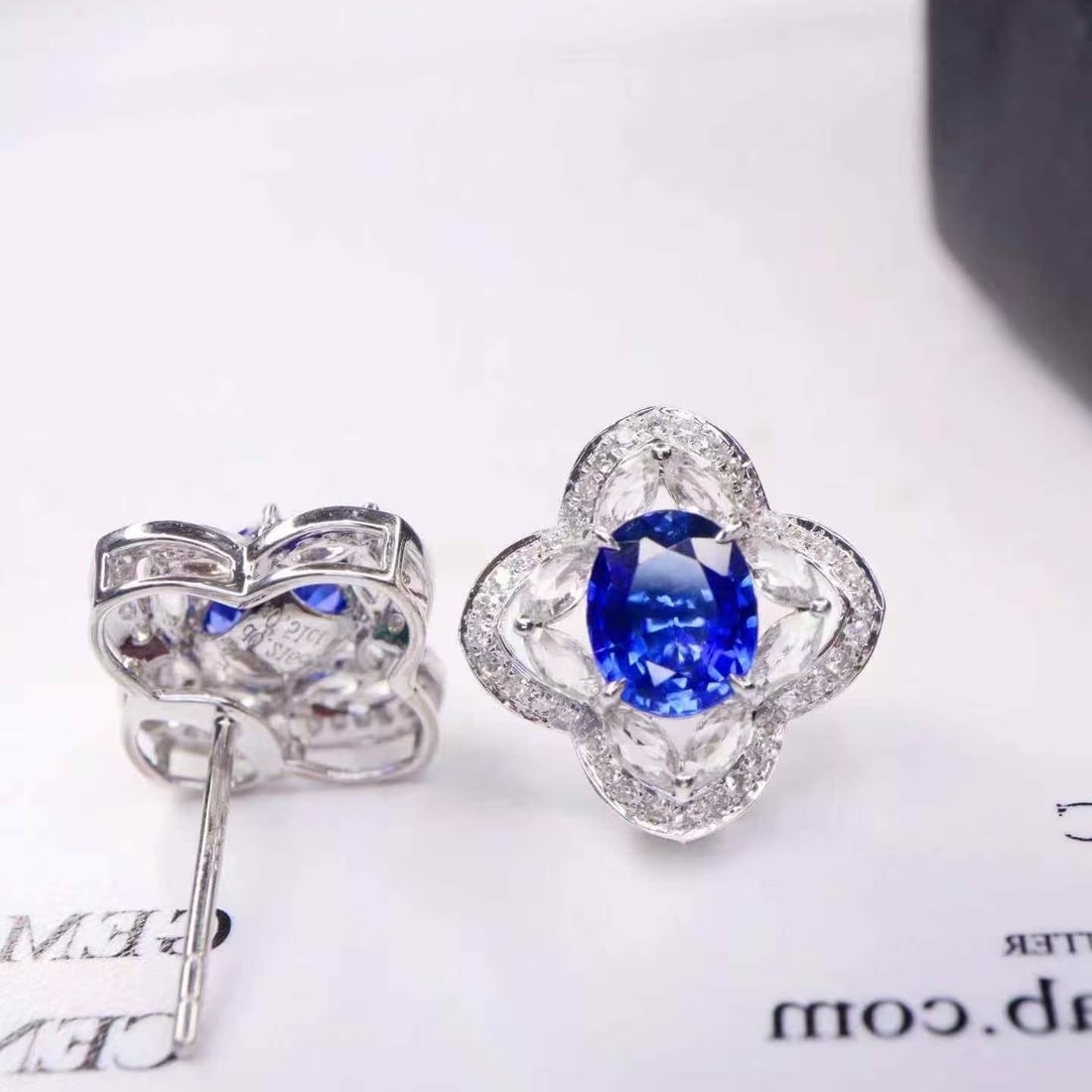 14k Gold 1.71 Ctw Natural Sapphire & Diamond Earrings: Ref:231160436 // gold content:14k gold // main gemstone:sapphire // shape:oval // carat weight:1. 5ct // color:blue // treatment:natural // // adjacent gemstone 2 : diamond // shape:round // carat