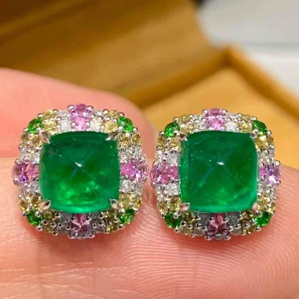 14k Gold 2.4 Ct Natural Emerald & Diamond Earrings: Ref:231153026 // gold content:14k gold // main gemstone:emerald // shape:sugar-loaf // carat weight:2. 4ct // color:green // treatment:natural // // adjacent gemstone 2 : diamond // shape:round //