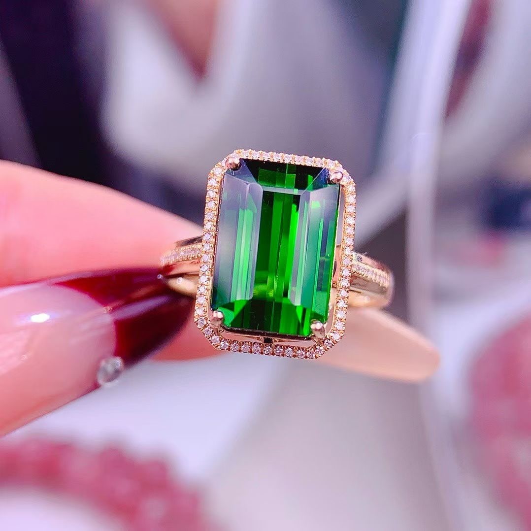 14k Gold 7.5 Ct Natural Tourmaline & Diamond Ring: Ref:231153063 // gold content:14k gold // ring size:7. 25us // // main gemstone:tourmaline // shape:octagonal // carat weight:7. 5ct // color:green // treatment:natural // // adjacent gemstone 2 : dia