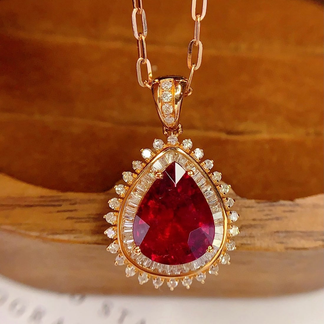 14k Gold 3.3 Ct Natural Tourmaline & Diamond Pendant( Without Chain ): Ref:231153106 // gold content:14k gold // main gemstone:tourmaline // shape:pear // carat weight:3. 3ct // color:red // treatment:natural // // adjacent gemstone 2 : diamond // number of stones:74 // 