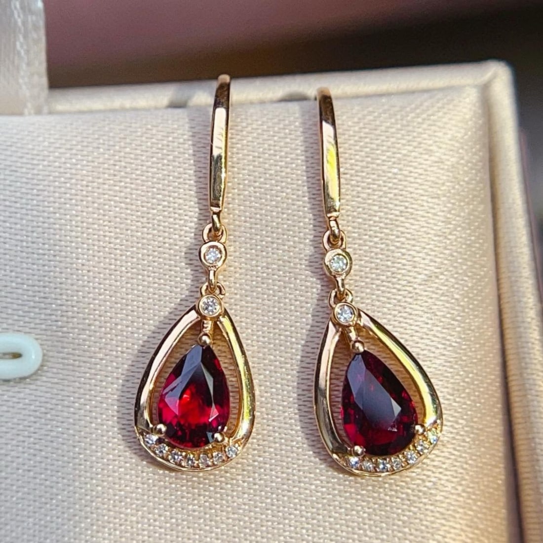 14k Gold 1.11 Ctw Natural Tourmaline & Diamond Earrings: Ref:231153158 // gold content:14k gold // main gemstone:tourmaline // shape:pear // carat weight:1. 05ct // color:red // treatment:natural // // adjacent gemstone 2 : diamond // number of stones:18