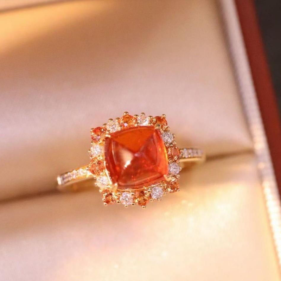 14k Gold 3.2 Ct Natural Spessartine & Diamond Ring: Ref:231153249 // gold content:14k gold // ring size:7. 25us // // main gemstone:spessartine // shape:sugar-loaf // carat weight:3. 2ct // color:orange // treatment:natural // // adjacent gemstone 2 :