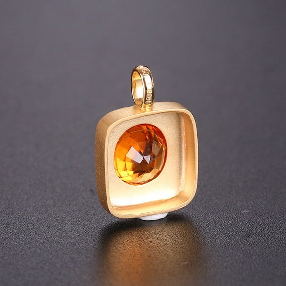 14k Gold 1.82 Ct Natural Spessartine Pendant( Without Chain ): Ref:231154004 // gold content:14k gold // main gemstone:spessartine // shape:oval // carat weight:1. 82ct // color:orange // treatment:natural // Low Estimate: 1200 Condition: New High Estimate: 1800