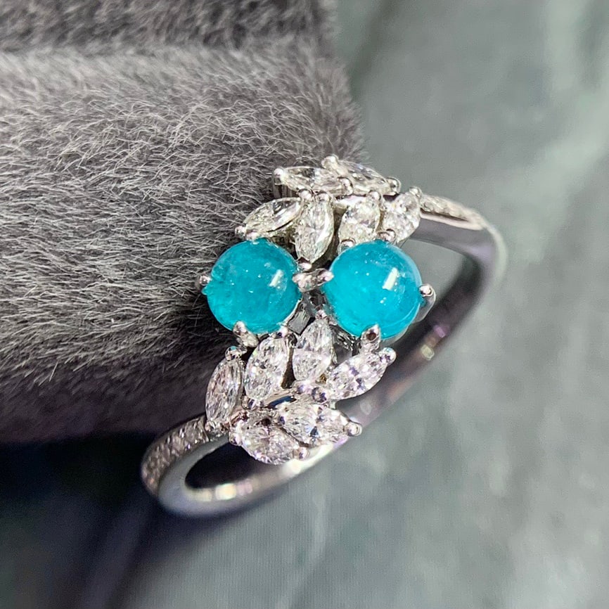 14k Gold 1.12 Ctw Natural Paraiba Tourmaline & Diamond Ring: Ref:231154012 // gold content:14k gold // ring size:7. 25us // // main gemstone:paraiba tourmaline // shape:round // carat weight:0. 58ct // color:blue // treatment:natural // cut grade:g // //