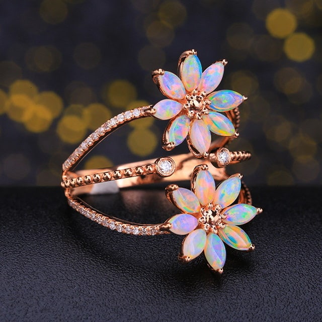 14k Gold 1.03 Ctw Natural Opal & Diamond Ring: Ref:231154031 // gold content:14k gold // ring size:7. 25us // // main gemstone:opal // shape:marquise // carat weight:0. 83ct // color:color // treatment:natural // // adjacent gemstone 2 : diamond