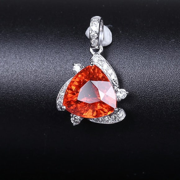 14k Gold 3.25 Ctw Natural Spessartine & Diamond Pendant( Without Chain ): Ref:231154034 // gold content:14k gold // main gemstone:spessartine // shape:triangle // carat weight:3. 11ct // color:orange // treatment:natural // // adjacent gemstone 2 : diamond // shape:round