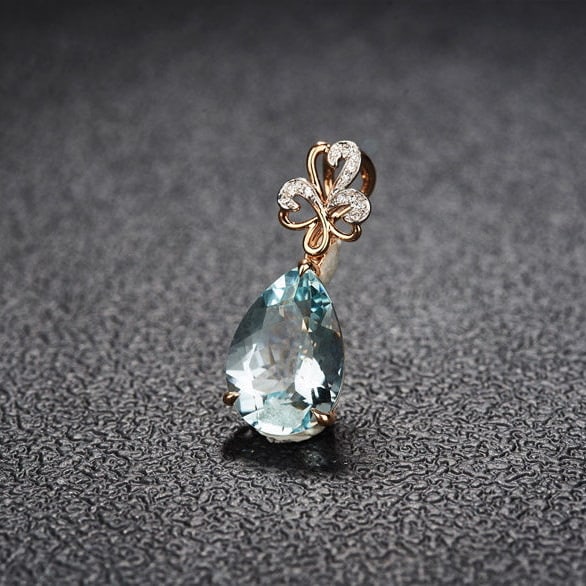 14k Gold 4.58 Ct Natural Aquamarine & Diamond Pendant( Without Chain ): Ref:231154036 // gold content:14k gold // main gemstone:aquamarine // shape:pear // carat weight:4. 58ct // color:blue // treatment:natural // // adjacent gemstone 2 : diamond // shape:round //