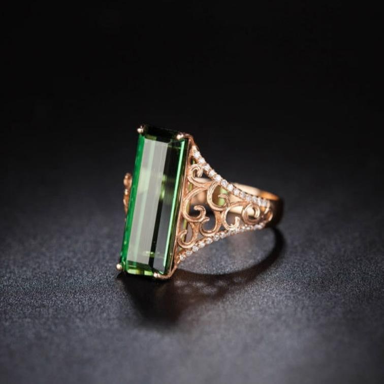 14k Gold 7.35 Ct Natural Tourmaline & Diamond Ring: Ref:231154078 // gold content:14k gold // ring size:7. 25us // // main gemstone:tourmaline // shape:octagonal // carat weight:7. 35ct // color:green // treatment:natural // // adjacent gemstone 2 :