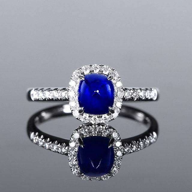 14k Gold 2.02 Ctw Natural Sapphire & Diamond Ring: Ref:231154124 // gold content:14k gold // ring size:7. 25us // // main gemstone:sapphire // shape:sugar-loaf // carat weight:1. 76ct // color:blue // treatment:natural // // adjacent gemstone 2 :