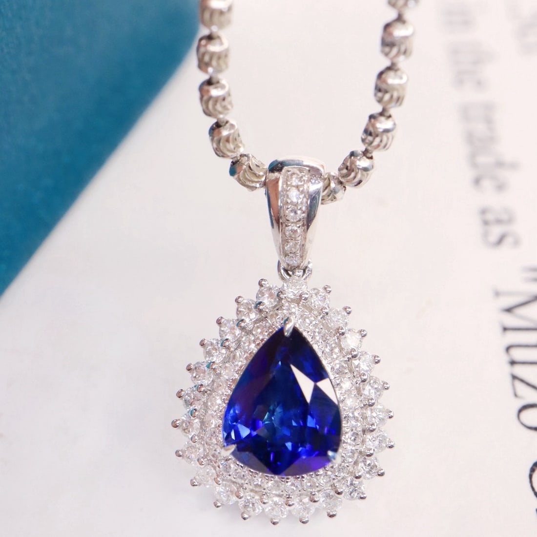 14k Gold 1.78 Ctw Natural Sapphire & Diamond Pendant( Without Chain ): Ref:231154135 // gold content:14k gold // main gemstone:sapphire // shape:pear // carat weight:1. 39ct // color:royal blue // treatment:natural // // adjacent gemstone 2 : diamond // shape:round //