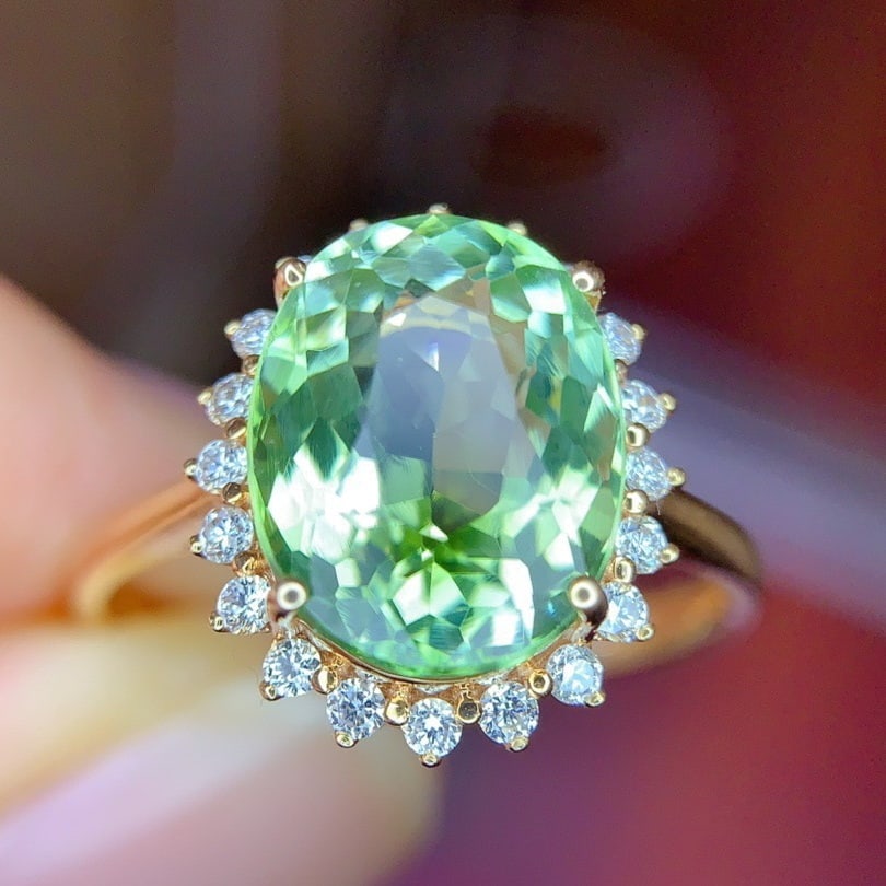 14k Gold 3.5 Ct Natural Tourmaline & Diamond Ring: Ref:231154145 // gold content:14k gold // ring size:7. 25us // // main gemstone:tourmaline // shape:oval // carat weight:3. 5ct // color:green // treatment:natural // // adjacent gemstone 2 : diamond