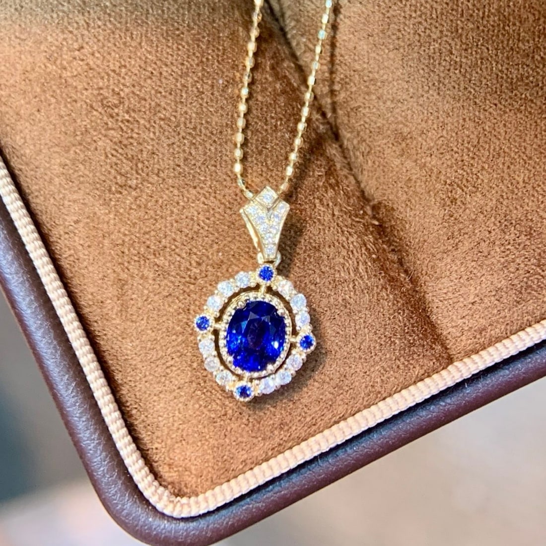 14k Gold 0.85 Ctw Natural Sapphire & Diamond Pendant( Without Chain ): Ref:231154183 // gold content:14k gold // main gemstone:sapphire // shape:oval // carat weight:0. 72ct // color:blue // treatment:natural // // adjacent gemstone 2 : diamond // shape:round // carat