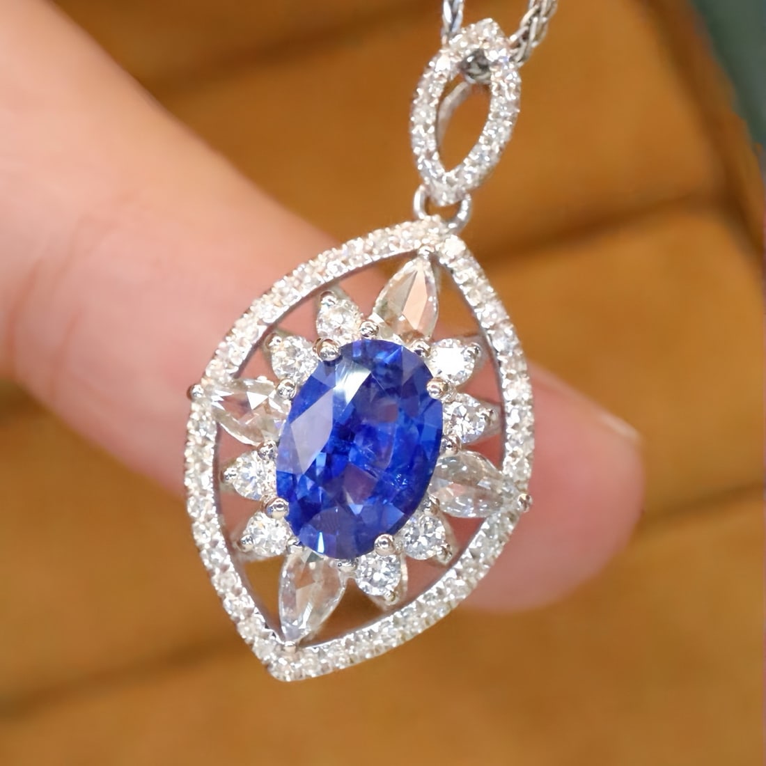 14k Gold 1.53 Ctw Natural Sapphire & Diamond Pendant( Without Chain ): Ref:231154199 // gold content:14k gold // main gemstone:sapphire // shape:oval // carat weight:1. 06ct // color:blue // treatment:natural // // adjacent gemstone 2 : diamond // number of stones:68 //