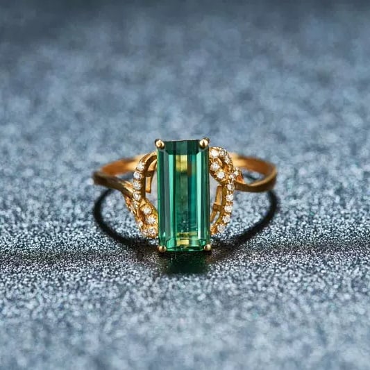 14k Gold 2.35 Ct Natural Tourmaline & Diamond Ring: Ref:231154231 // gold content:14k gold // ring size:7. 25us // // main gemstone:tourmaline // shape:octagonal // carat weight:2. 35ct // color:green // treatment:natural // // adjacent gemstone 2 :