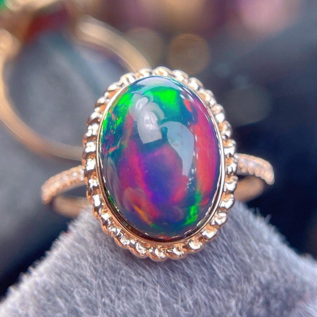 14k Gold 4.4 Ct Natural Opal & Diamond Ring: Ref:231154324 // gold content:14k gold // ring size:7. 25us // // main gemstone:opal // shape:oval // carat weight:4. 4ct // color:color // treatment:natural // // adjacent gemstone 2 : diamond //
