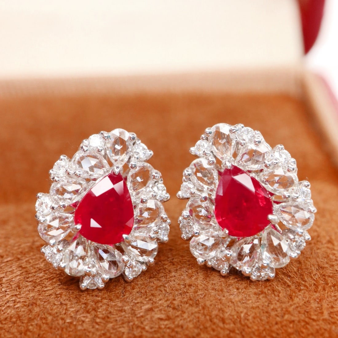 14k Gold 1.18 Ctw Vivid Red Natural Ruby & Diamond Earrings: Ref:231154326 // gold content:14k gold // main gemstone:ruby // shape:pear // carat weight:1. 00ct // color:vivid red // treatment:natural // // adjacent gemstone 2 : diamond // shape:round // carat w