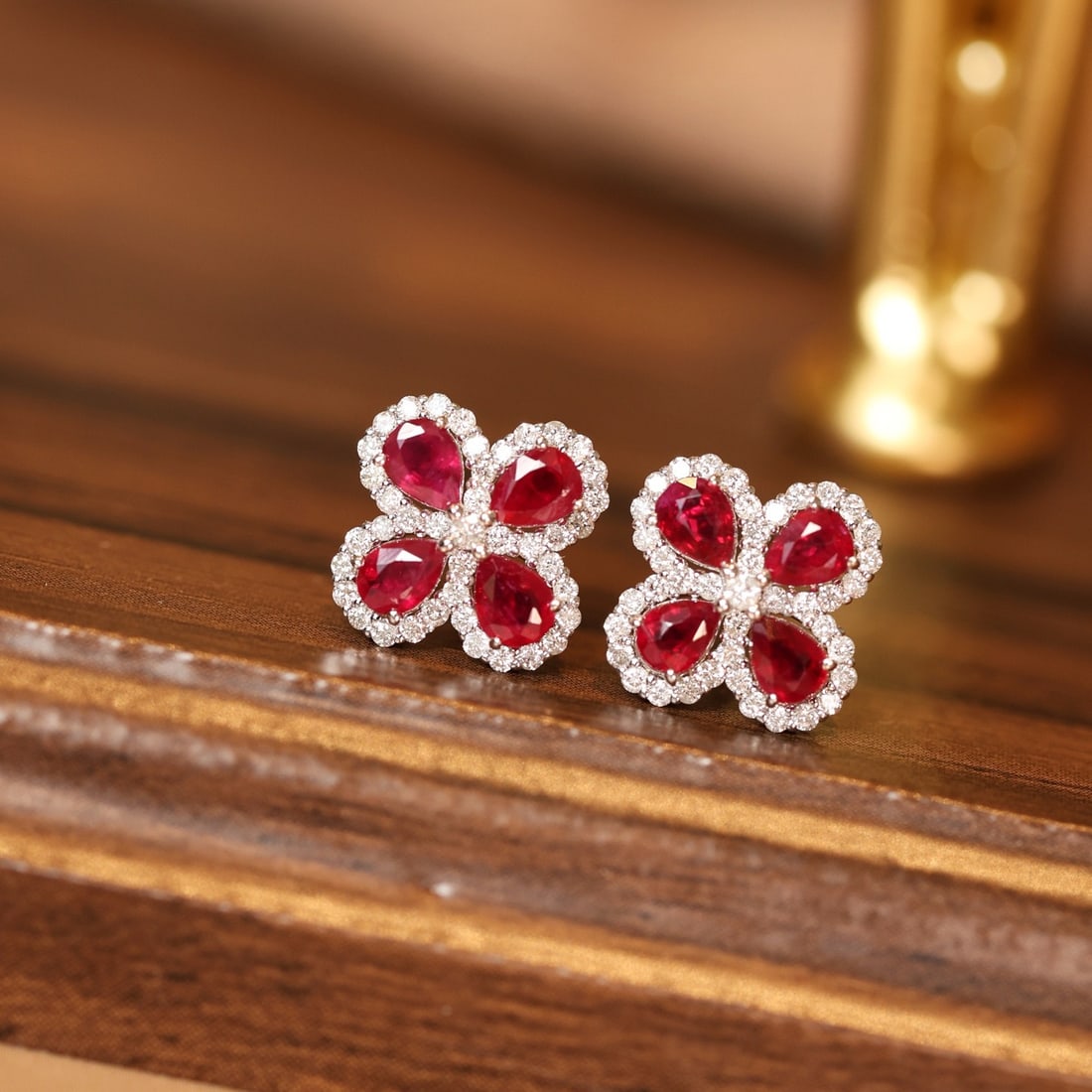 14k Gold 1.89 Ctw Vivid Red Natural Ruby & Diamond Earrings: Ref:231154337 // gold content:14k gold // main gemstone:ruby // shape:pear // carat weight:1. 46ct // color:vivid red // treatment:natural // // adjacent gemstone 2 : diamond // shape:round // carat
