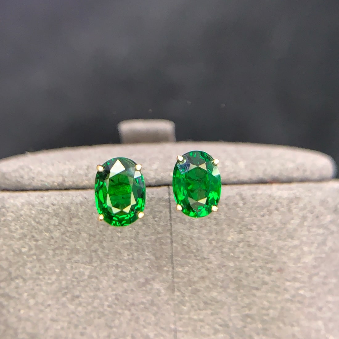 14k Gold 1.8 Ct Natural Tsavorite Earrings: Ref:231154350 // gold content:14k gold // main gemstone:tsavorite // shape:oval // carat weight:1. 8ct // color:green // treatment:natural // Condition: New Low Estimate: 1700 High Estimate: 2500