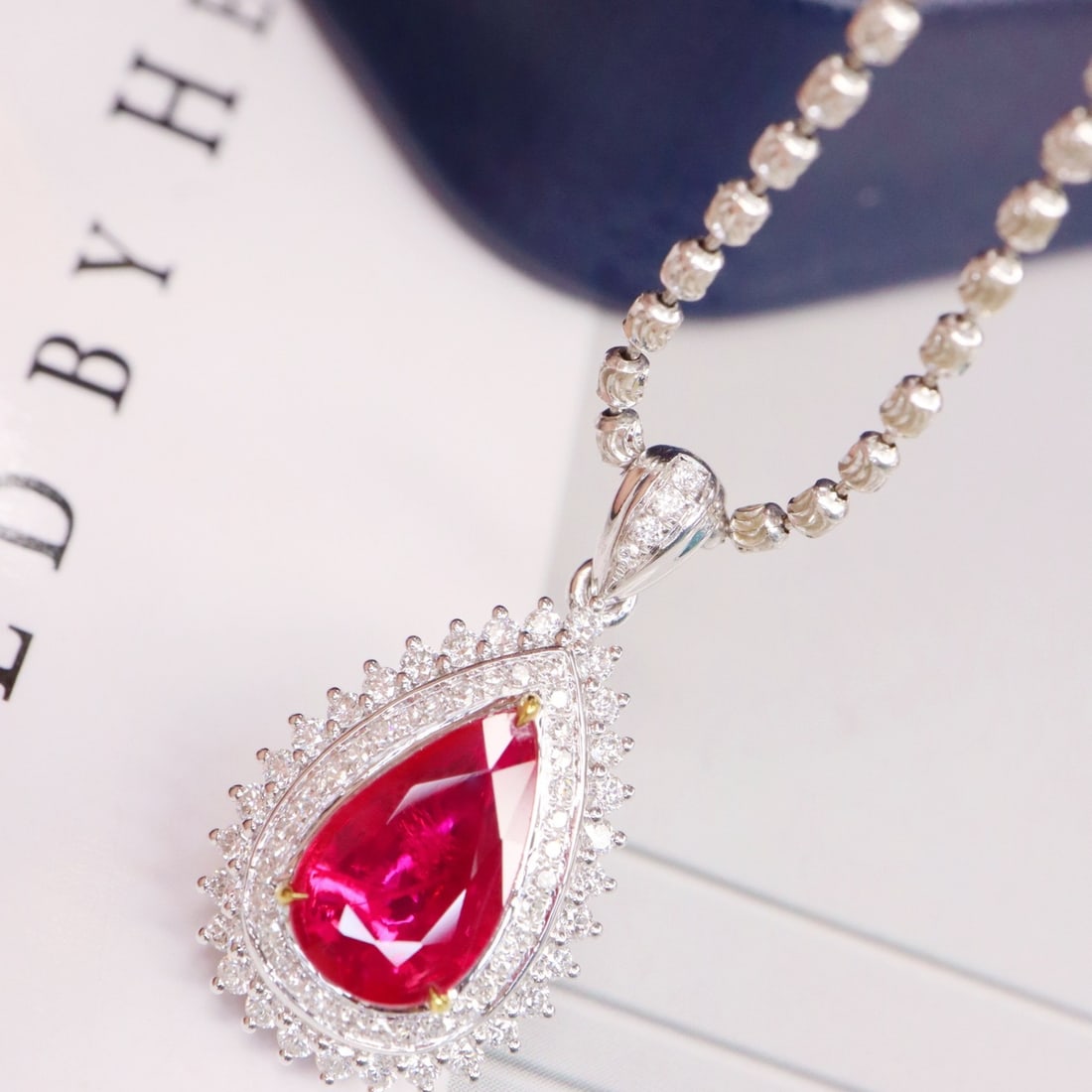14k Gold 1.41 Ctw Natural Ruby & Diamond Pendant( Without Chain ): Ref:231154377 // gold content:14k gold // main gemstone:ruby // shape:pear // carat weight:1. 06ct // color:red // treatment:natural // // adjacent gemstone 2 : diamond // shape:round // carat weight:
