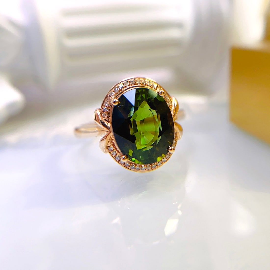 14k Gold 4.15 Ct Natural Tourmaline & Diamond Ring: Ref:231154400 // gold content:14k gold // ring size:7. 25us // // main gemstone:tourmaline // shape:oval // carat weight:4. 15ct // color:green // treatment:natural // // adjacent gemstone 2 :
