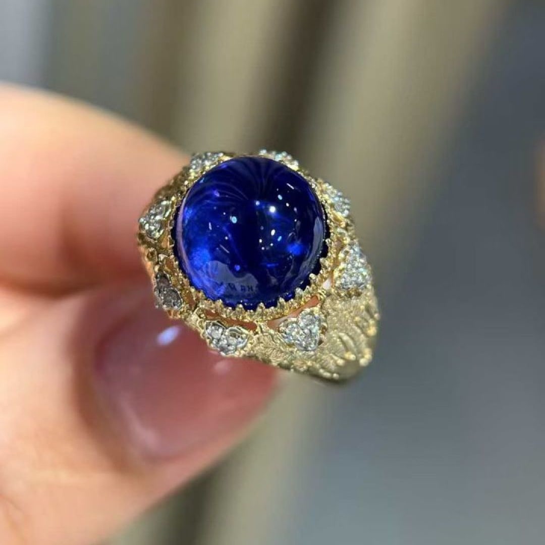 14k Gold 6.63 Ct Natural Tanzanite & Diamond Ring: Ref:231154417 // gold content:14k gold // ring size:7. 25us // // main gemstone:tanzanite // shape:round // carat weight:6. 63ct // color:blue // treatment:natural // cut grade:g // // adjacent