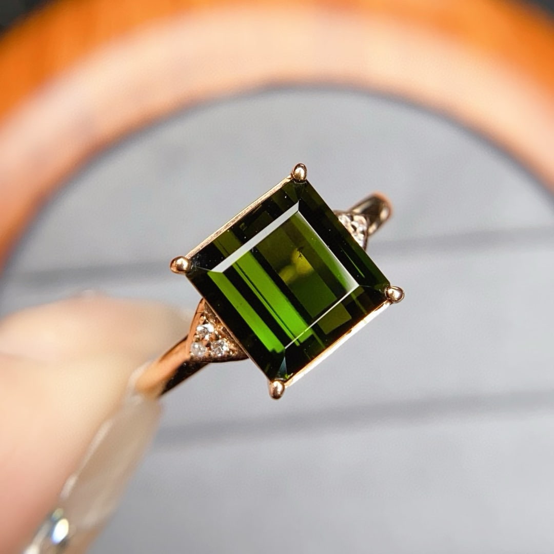 14k Gold 3.08 Ctw Natural Tourmaline & Diamond Ring: Ref:230922273 // gold content:14k gold // ring size:7. 25us // // main gemstone:tourmaline // shape:octagonal // carat weight:3. 05ct // color:green // treatment:natural // // adjacent gemstone 2 :