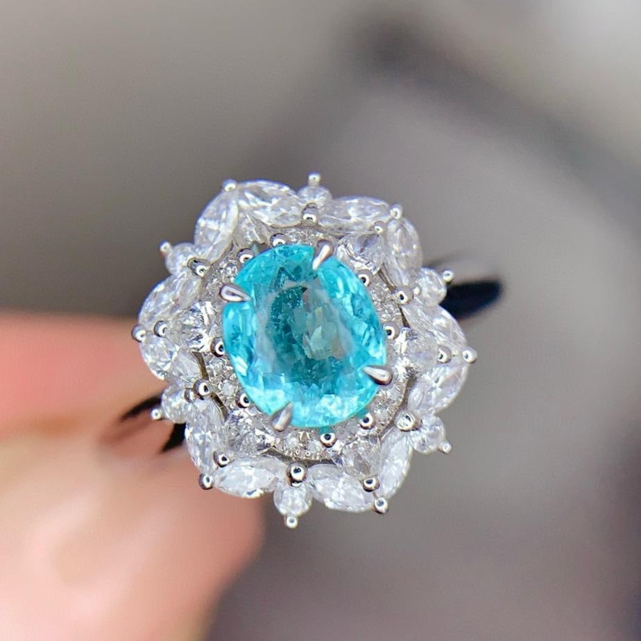 14k Gold 0.74 Ct Natural Paraiba Tourmaline & Diamond Ring: Ref:231161065 // gold content:14k gold // ring size:7. 25us // // main gemstone:paraiba tourmaline // shape:oval // carat weight:0. 74ct // color:blue // treatment:natural // // adjacent gemstone 2 :