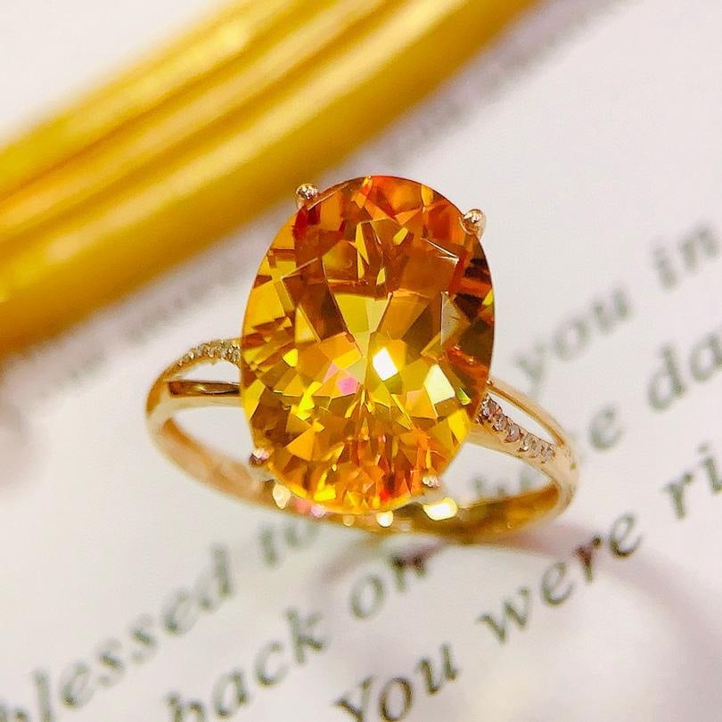 14k Gold 5.35 Ctw Natural Citrine & Diamond Ring: Ref:231161070 // gold content:14k gold // ring size:7. 25us // // main gemstone:citrine // shape:oval // carat weight:5. 3ct // color:yellow // treatment:natural // // adjacent gemstone 2 : diamond
