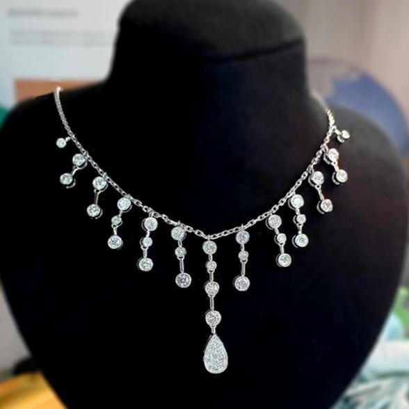 14k Gold 2.05 Ct Natural H Diamond Necklace: Ref:231161099 // gold content:14k gold // main gemstone:diamond // shape:round // carat weight:2. 05ct // clarity grade:vs-si // color:h // treatment:natural // cut grade:g // Low Estimate: 10000