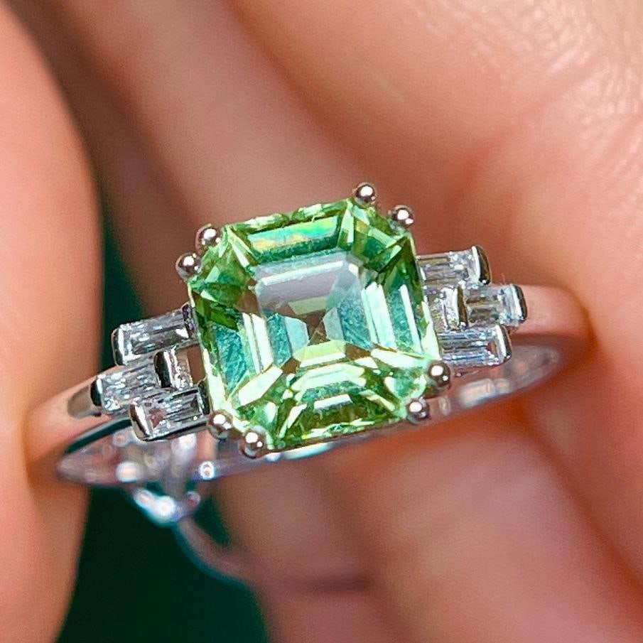 14k Gold 1.24 Ctw Natural Tourmaline & Diamond Ring: Ref:231161117 // gold content:14k gold // ring size:7. 25us // // main gemstone:tourmaline // shape:octagonal // carat weight:1. 15ct // color:green // treatment:natural // // adjacent gemstone 2 :