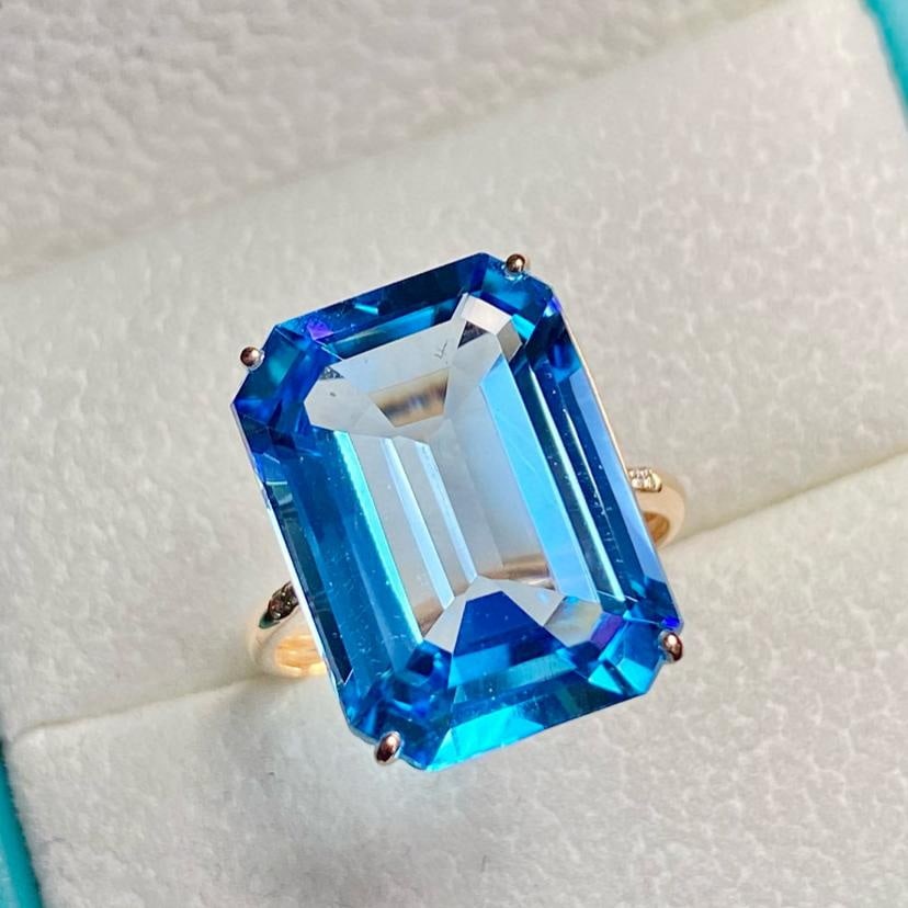 14k Gold 15.55 Ct Natural Topaz & Diamond Ring: Ref:231161150 // gold content:14k gold // ring size:7. 25us // // main gemstone:topaz // shape:octagonal // carat weight:15. 55ct // color:blue // treatment:natural // // adjacent gemstone 2 :
