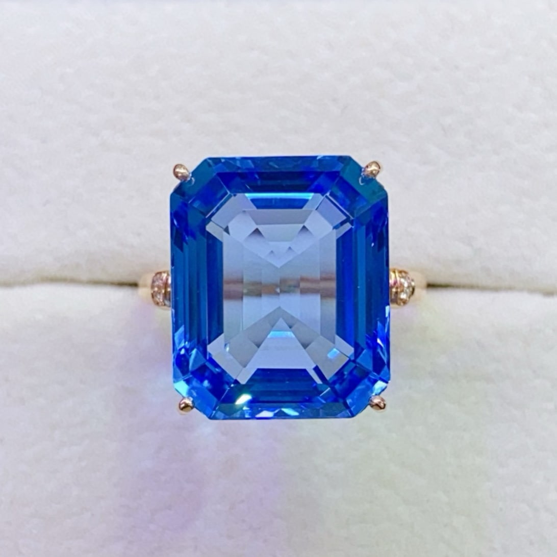 14k Gold 18.02 Ctw Natural Topaz & Diamond Ring: Ref:231161198 // gold content:14k gold // ring size:7. 25us // // main gemstone:topaz // shape:octagonal // carat weight:18ct // color:blue // treatment:natural // // adjacent gemstone 2 : diamond //
