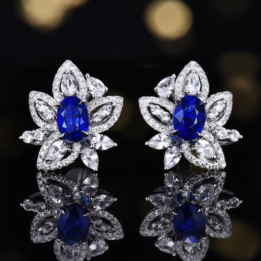 14k Gold 1.30 Ctw Natural Sapphire & Diamond Earrings: Ref:231162028 // gold content:14k gold // main gemstone:sapphire // shape:oval // carat weight:1. 05ct // color:royal blue // treatment:natural // // adjacent gemstone 2 : diamond // number of stones: