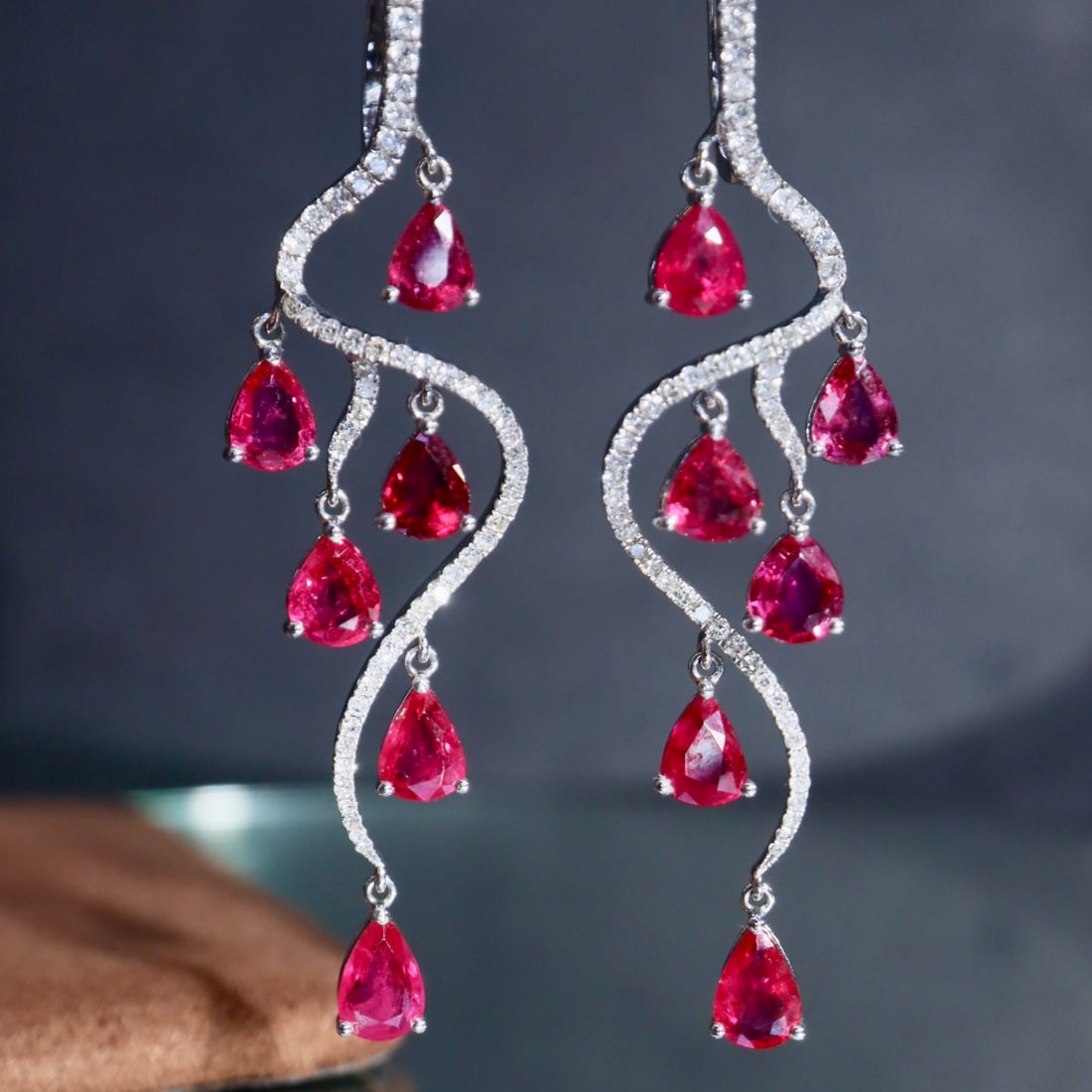 14k Gold 5.26 Ctw Natural Ruby & Diamond Earrings: Ref:231162081 // gold content:14k gold // main gemstone:ruby // shape:pear // carat weight:4. 7ct // color:red // treatment:natural // // adjacent gemstone 2 : diamond // shape:round // carat weight:0