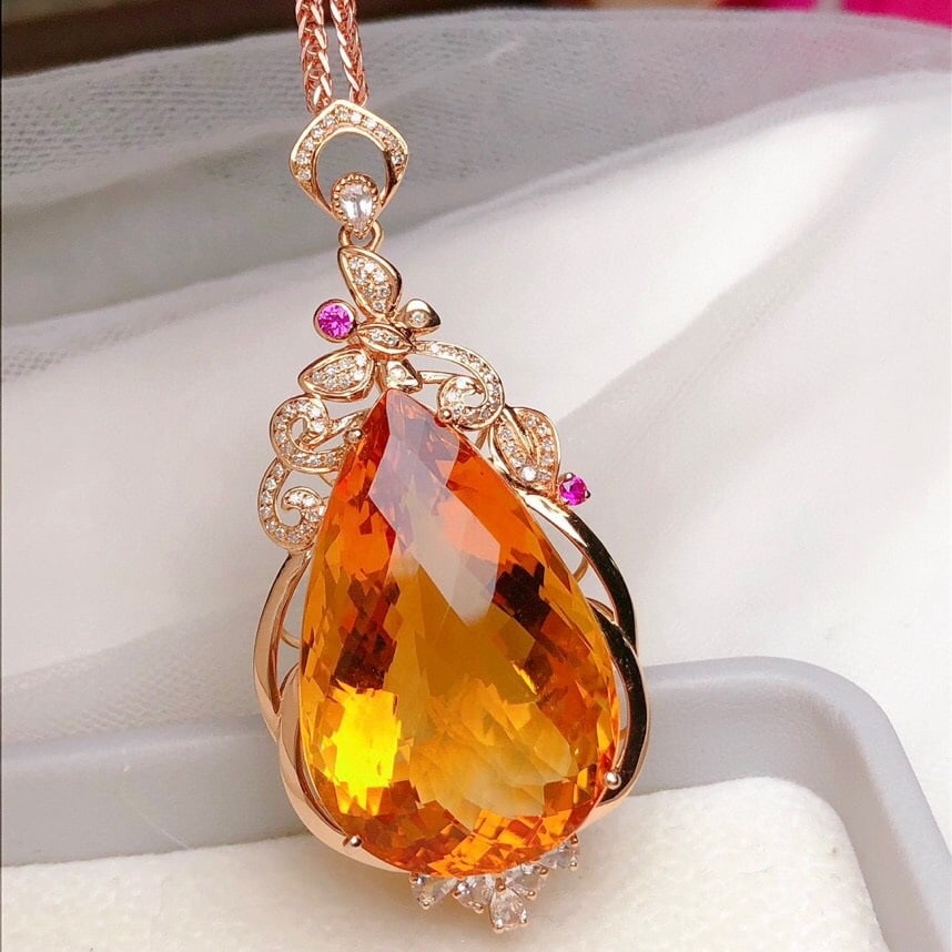 14k Gold 41.06 Ct Natural Citrine & Diamond & Sapphire Pendant( Without Chain ): Ref:231162087 // gold content:14k gold // main gemstone:citrine // shape:pear // carat weight:41. 06ct // color:yellow // treatment:natural // // adjacent gemstone 2 : diamond // shape:round // clarit