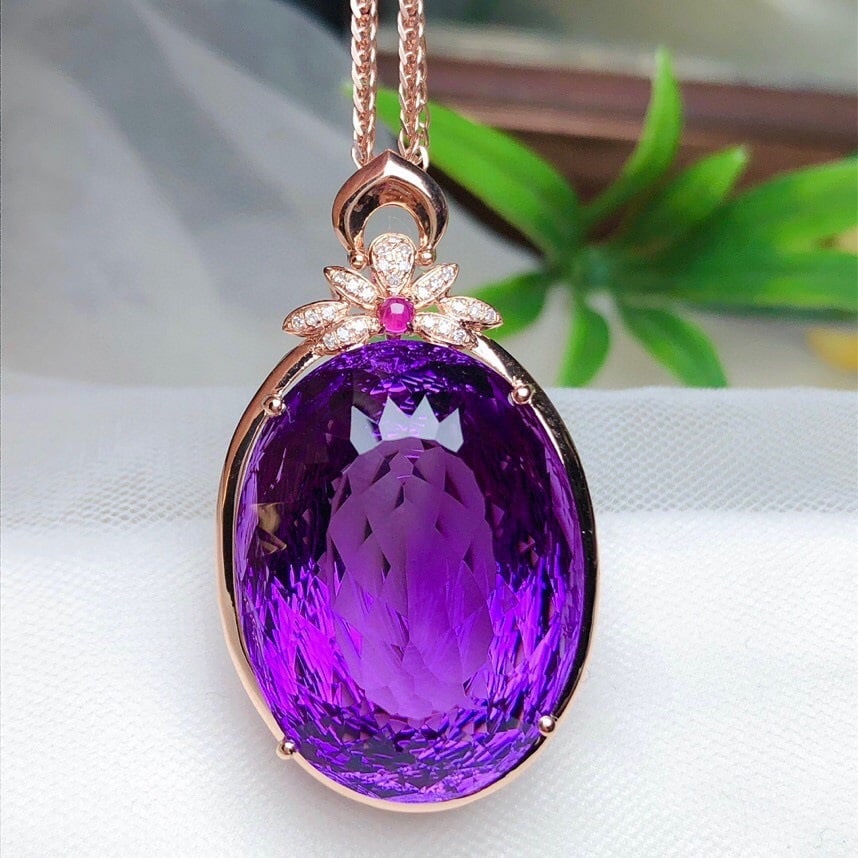 14k Gold 40.85 Ct Natural Amethyst & Diamond Pendant( Without Chain ): Ref:231162130 // gold content:14k gold // main gemstone:amethyst // shape:oval // carat weight:40. 85ct // color:purple // treatment:natural // // adjacent gemstone 2 : diamond // shape:round //