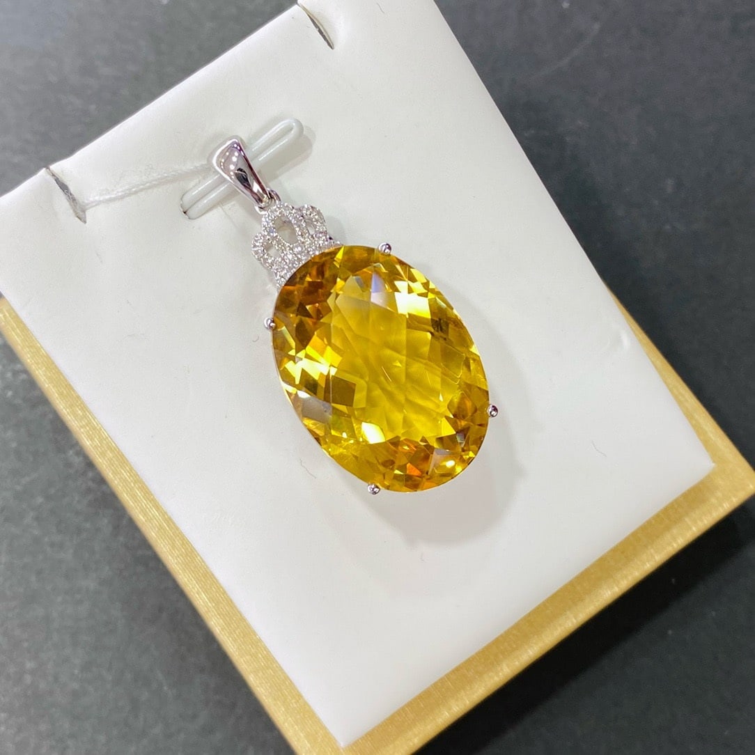 14k Gold 29.06 Ctw Natural Citrine & Diamond Pendant( Without Chain ): Ref:231162316 // gold content:14k gold // main gemstone:citrine // shape:oval // carat weight:28. 94ct // color:yellow // treatment:natural // // adjacent gemstone 2 : diamond // number of stones:25 /