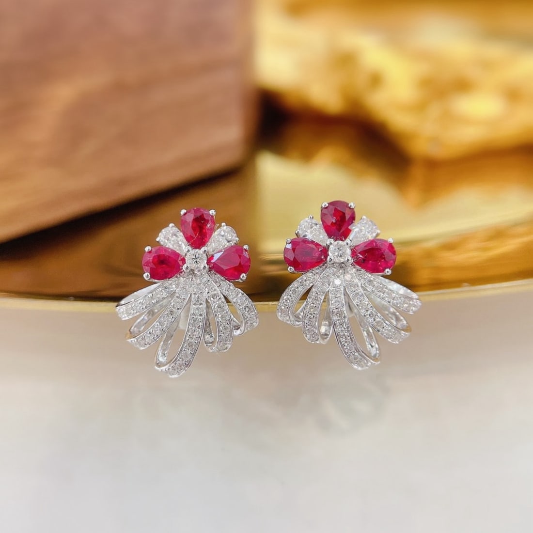 14k Gold 1.54 Ctw Natural Ruby & Diamond Earrings: Ref:231162323 // gold content:14k gold // main gemstone:ruby // shape:pear // carat weight:1. 06ct // color:red // treatment:natural // // adjacent gemstone 2 : diamond // shape:multiple // carat