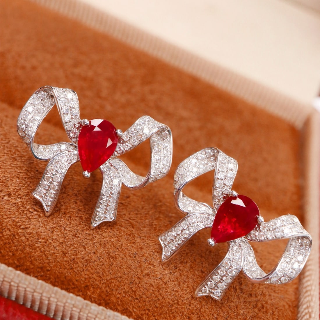 14k Gold 1.70 Ctw Vivid Red Natural Ruby & Diamond Earrings: Ref:231162347 // gold content:14k gold // main gemstone:ruby // shape:pear // carat weight:1. 18ct // color:vivid red // treatment:natural // // adjacent gemstone 2 : diamond // shape:round // carat