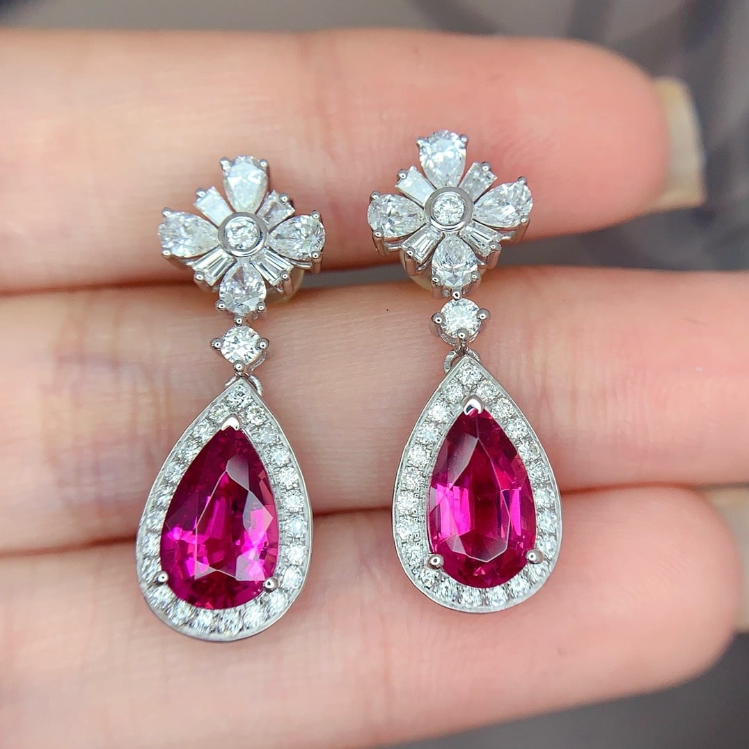 14k Gold 3 Ct Natural Tourmaline & Diamond Earrings: Ref:231162359 // gold content:14k gold // main gemstone:tourmaline // shape:pear // carat weight:3ct // color:red // treatment:natural // // adjacent gemstone 2 : diamond // shape:multiple // clarity 