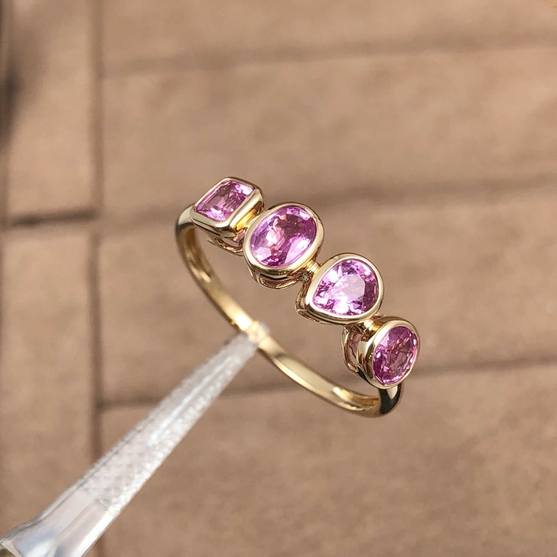 14k Gold 1.18 Ct Natural Sapphire Ring: Ref:231162378 // gold content:14k gold // ring size:7. 25us // // main gemstone:sapphire // shape:multiple // carat weight:1. 18ct // color:pink // treatment:natural // Low Estimate: 2400 Condition: