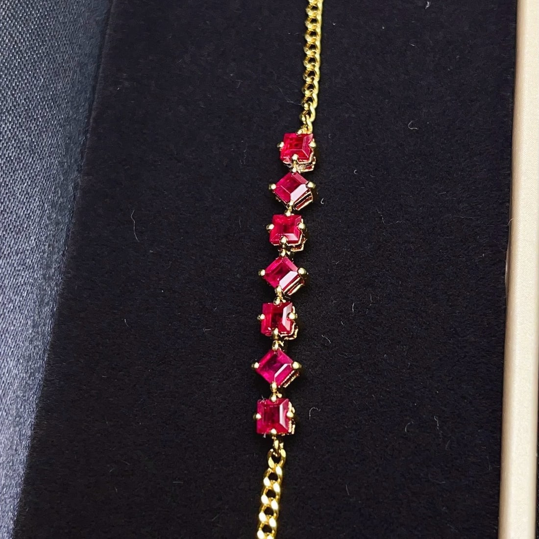 14k Gold 2.00 Ct Natural Ruby Bracelet: Ref:231162381 // gold content:14k gold // main gemstone:ruby // shape:square // carat weight:2. 00ct // color:red // treatment:natural // Condition: New Low Estimate: 3100 High Estimate: 4600