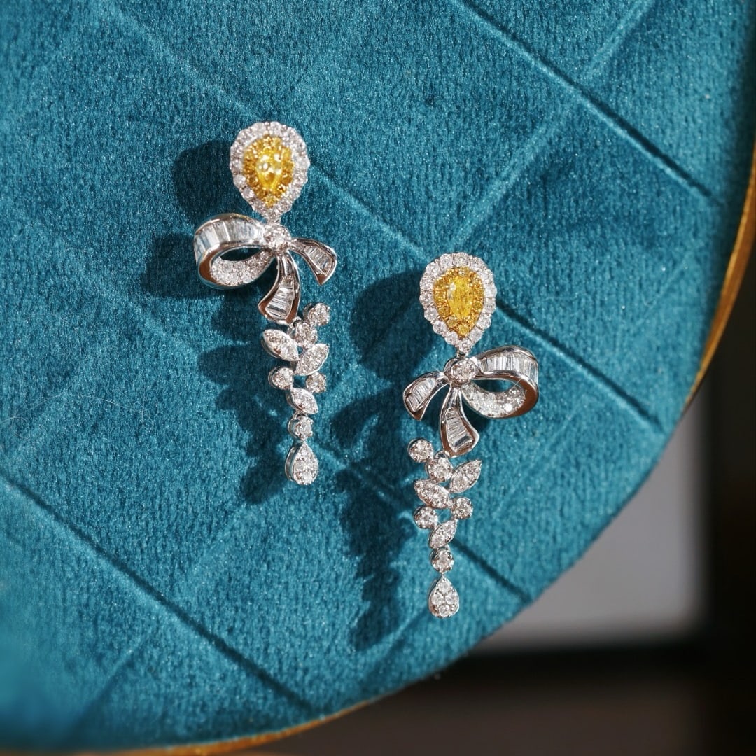 14k Gold 1.20 Ctw Natural Yellow Diamond & Diamond Earrings: Ref:231162390 // gold content:14k gold // main gemstone:yellow diamond // shape:pear // carat weight:0. 26ct // color:yellow // treatment:natural // // adjacent gemstone 2 : diamond // shape:multiple
