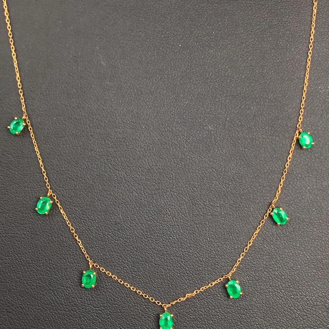 14k Gold 1.30 Ct Natural Emerald Necklace: Ref:231162391 // gold content:14k gold // main gemstone:emerald // shape:oval // carat weight:1. 30ct // color:green // treatment:natural // High Estimate: 3300 Low Estimate: 2200 Condition: New