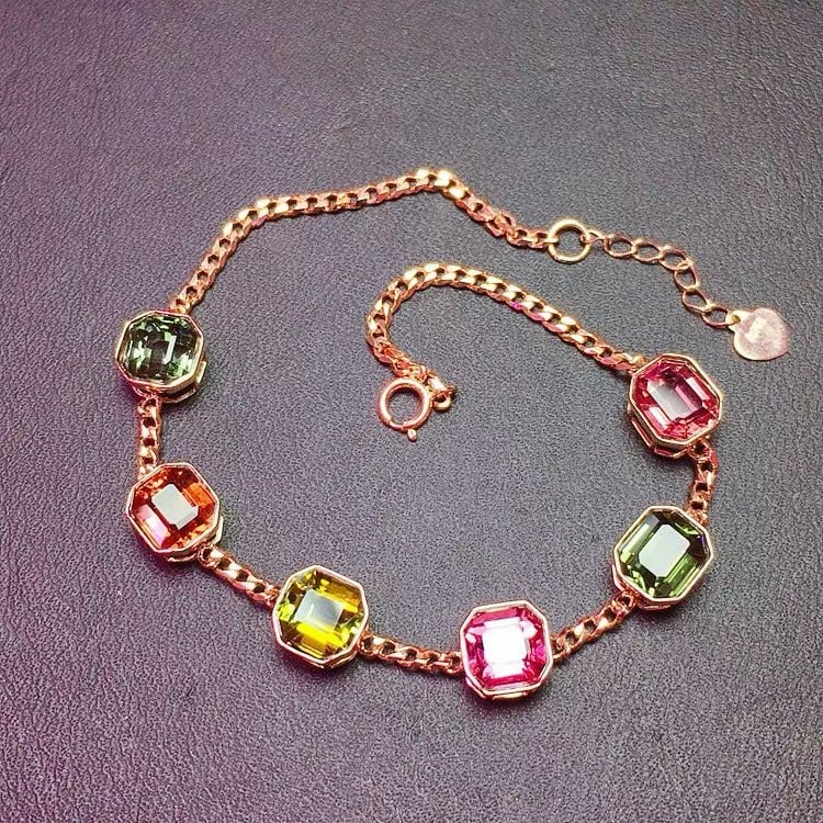 14k Gold 7.6 Ct Natural Tourmaline Bracelet: Ref:231162400 // gold content:14k gold // main gemstone:tourmaline // shape:octagonal // carat weight:7. 6ct // color:color // treatment:natural // Condition: New Low Estimate: 6200 High Estimate:
