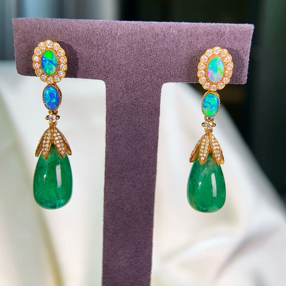 14k Gold 16.78 Ct Natural Emerald & Diamond & Opal Earrings: Ref:231162421 // gold content:14k gold // main gemstone:emerald // shape:pear // carat weight:16. 78ct // color:green // treatment:natural // // adjacent gemstone 2 : diamond // shape:round //