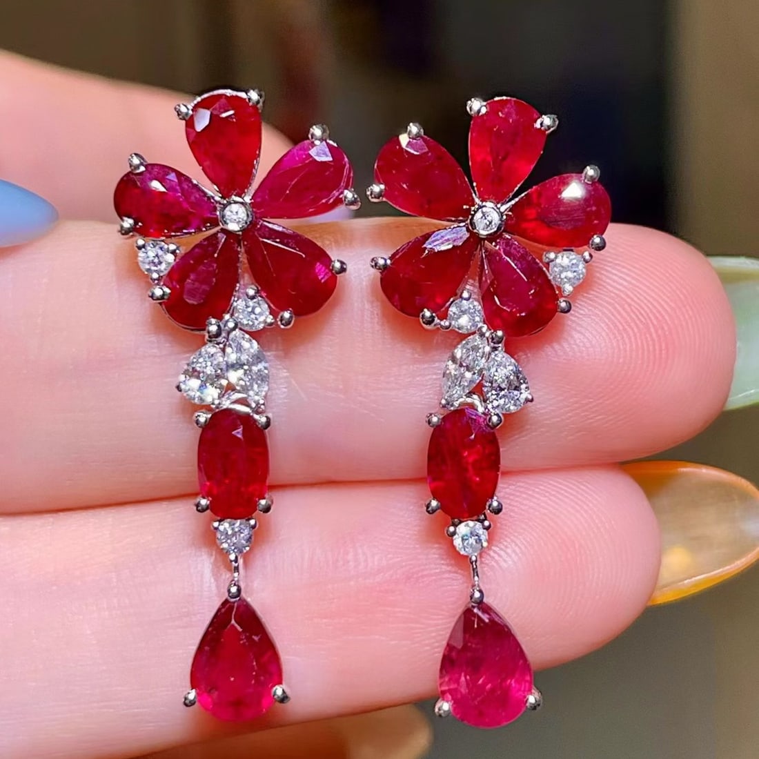 14k Gold 7.99 Ctw Natural Ruby & Diamond Earrings: Ref:231162435 // gold content:14k gold // main gemstone:ruby // shape:pear // carat weight:7. 49ct // color:red // treatment:natural // // adjacent gemstone 2 : diamond // shape:multiple // carat weig