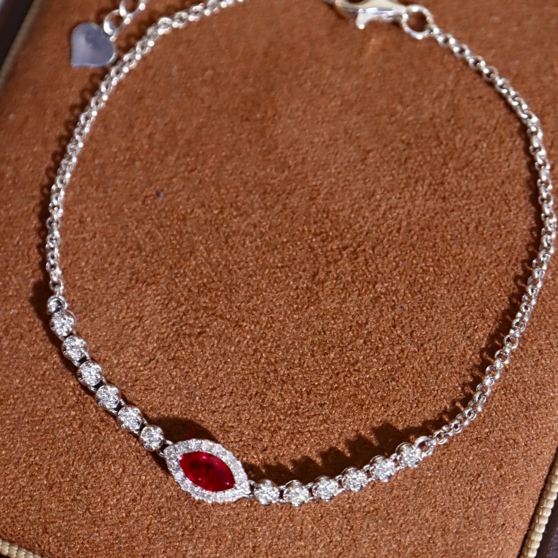14k Gold 0.54 Ctw Natural Ruby & Diamond Bracelet: Ref:231162450 // gold content:14k gold // main gemstone:ruby // shape:marquise // carat weight:0. 35ct // color:red // treatment:natural // // adjacent gemstone 2 : diamond // shape:round // carat