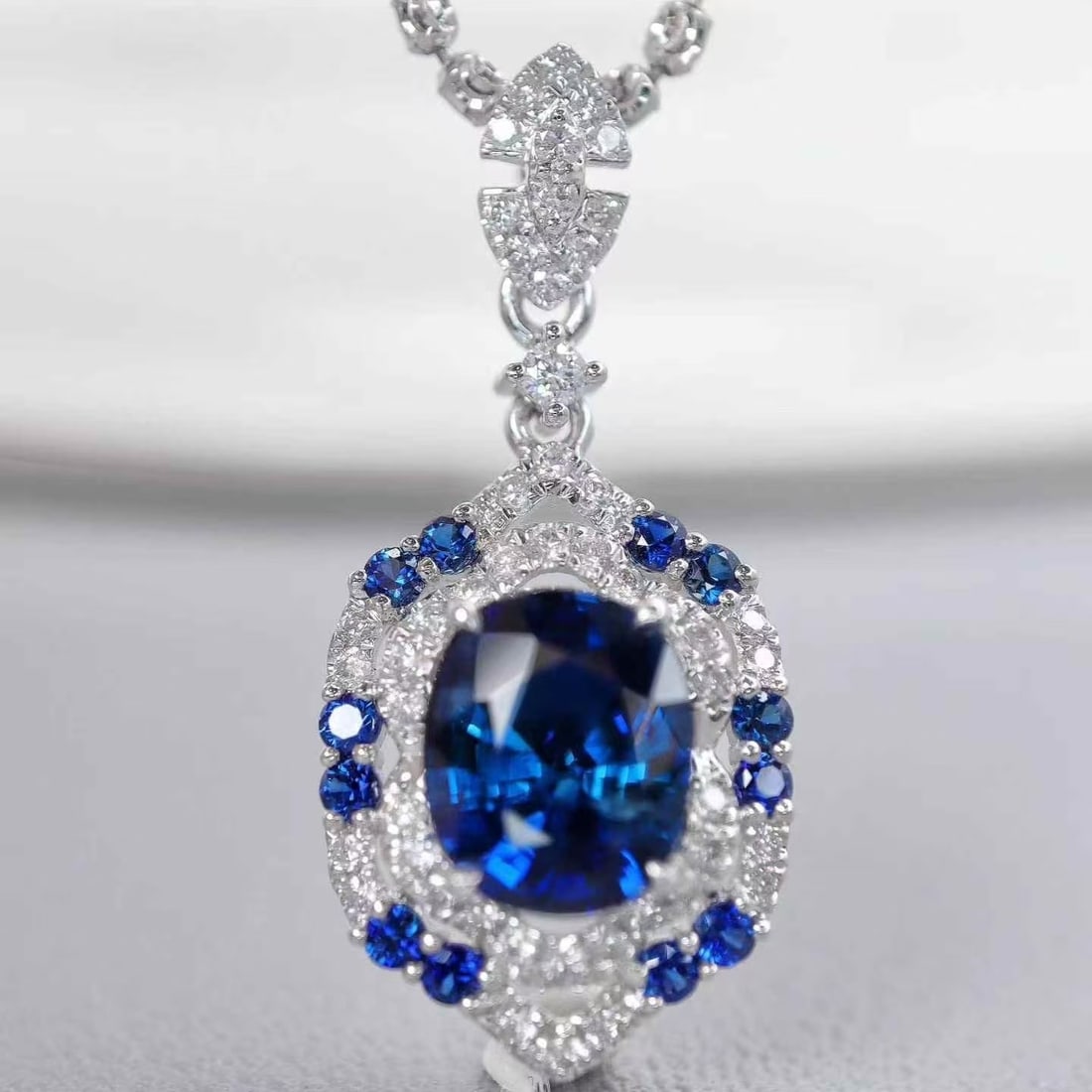 14k Gold 2.17 Ctw Natural Sapphire & Diamond Pendant( Without Chain ): Ref:231163002 // gold content:14k gold // main gemstone:sapphire // shape:oval // carat weight:1. 9ct // color:blue // treatment:natural // // adjacent gemstone 2 : diamond // shape:round // carat