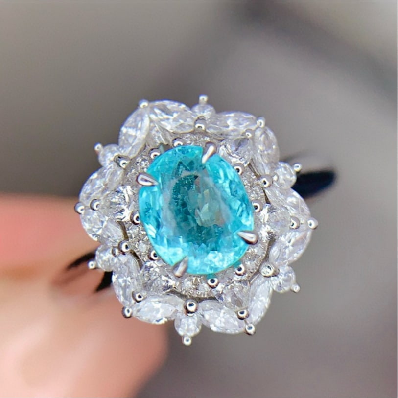 14k Gold 0.74 Ct Natural Paraiba Tourmaline & Diamond Ring: Ref:231163021 // gold content:14k gold // ring size:7. 25us // // main gemstone:paraiba tourmaline // shape:oval // carat weight:0. 74ct // color:blue // treatment:natural // // adjacent gemstone 2 :